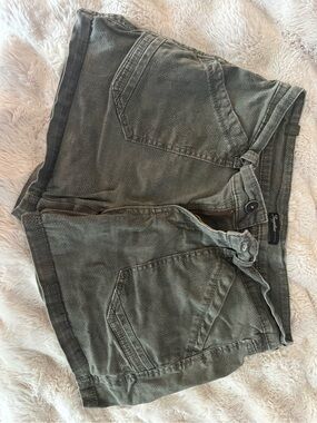 Green camo-like cargo jean shorts